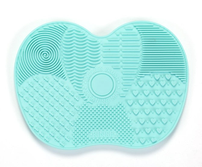 Makeup brush cleaning pad